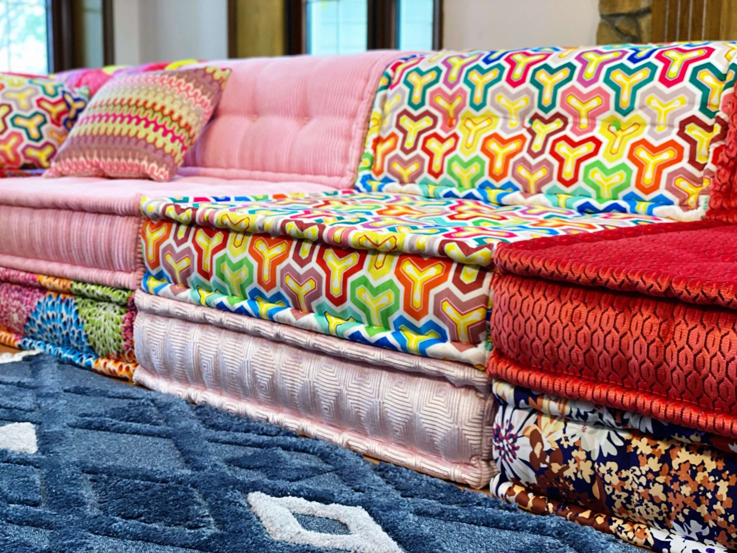 Do you offer trade programs? Lila & Lin Villas Furniture, Couch, studio couch, Outdoor furniture, Rectangle, Art, Wood, Pattern, Flooring, Living room