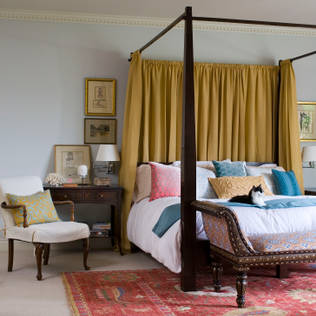 How to use a four poster bed canopy to good effect