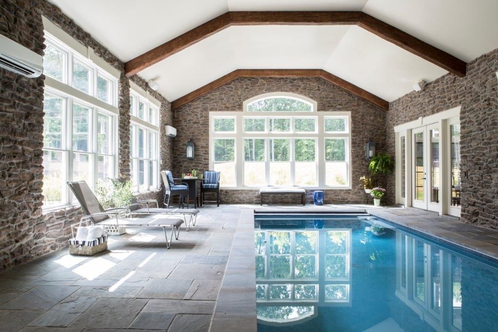 Riverside Retreat - Indoor Pool homify Pool indoor pool,pool,custom,beams,wood beams,chaise,estate,high end,rock wall